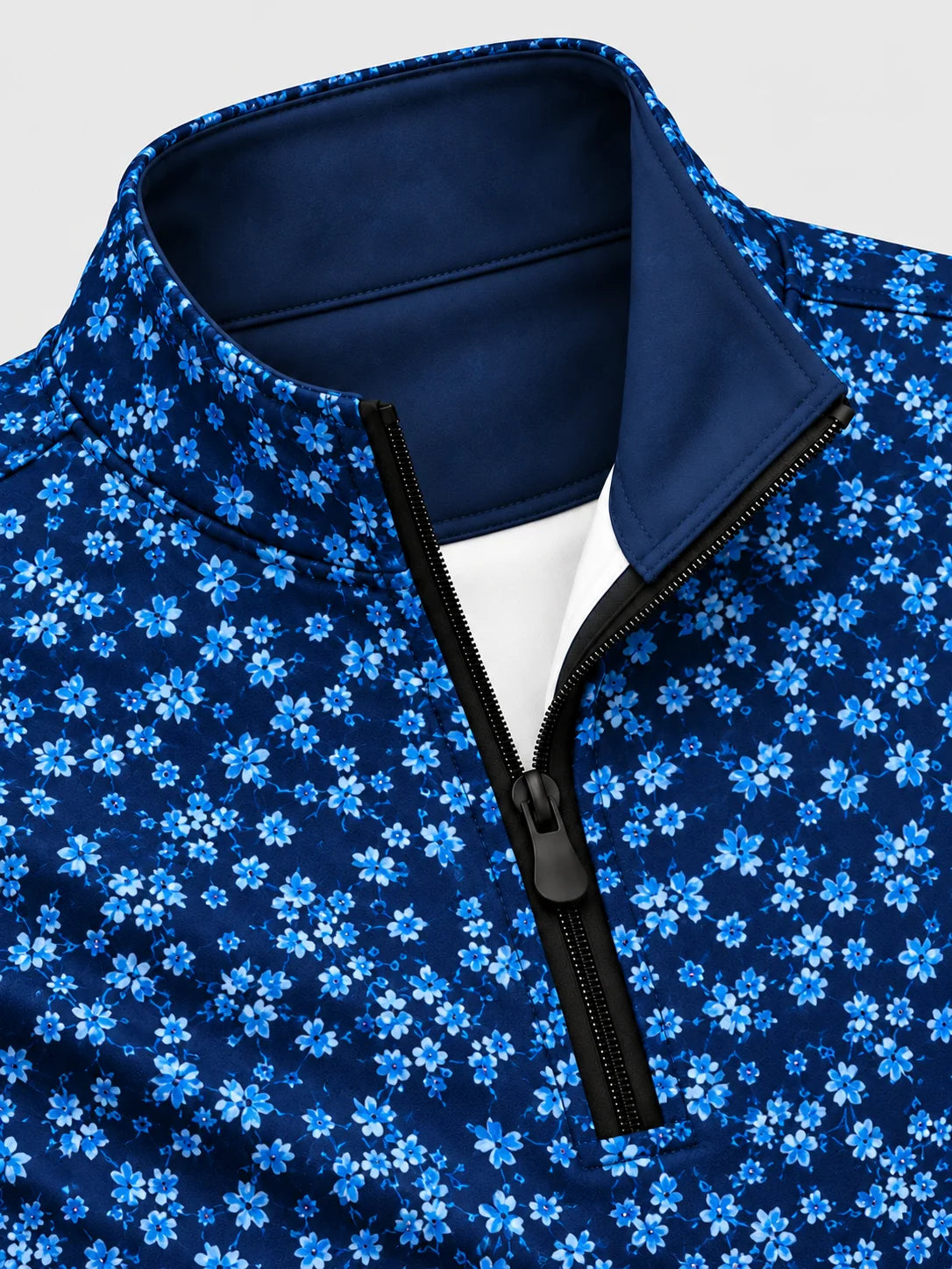 Performance-Pullover in Marineblau mit Blumenmuster und Viertelreißverschluss