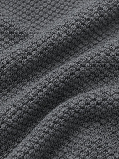 Golfpullover mit Waffelstruktur in Anthrazitgrau, Funktionsmaterial und Viertelreißverschluss