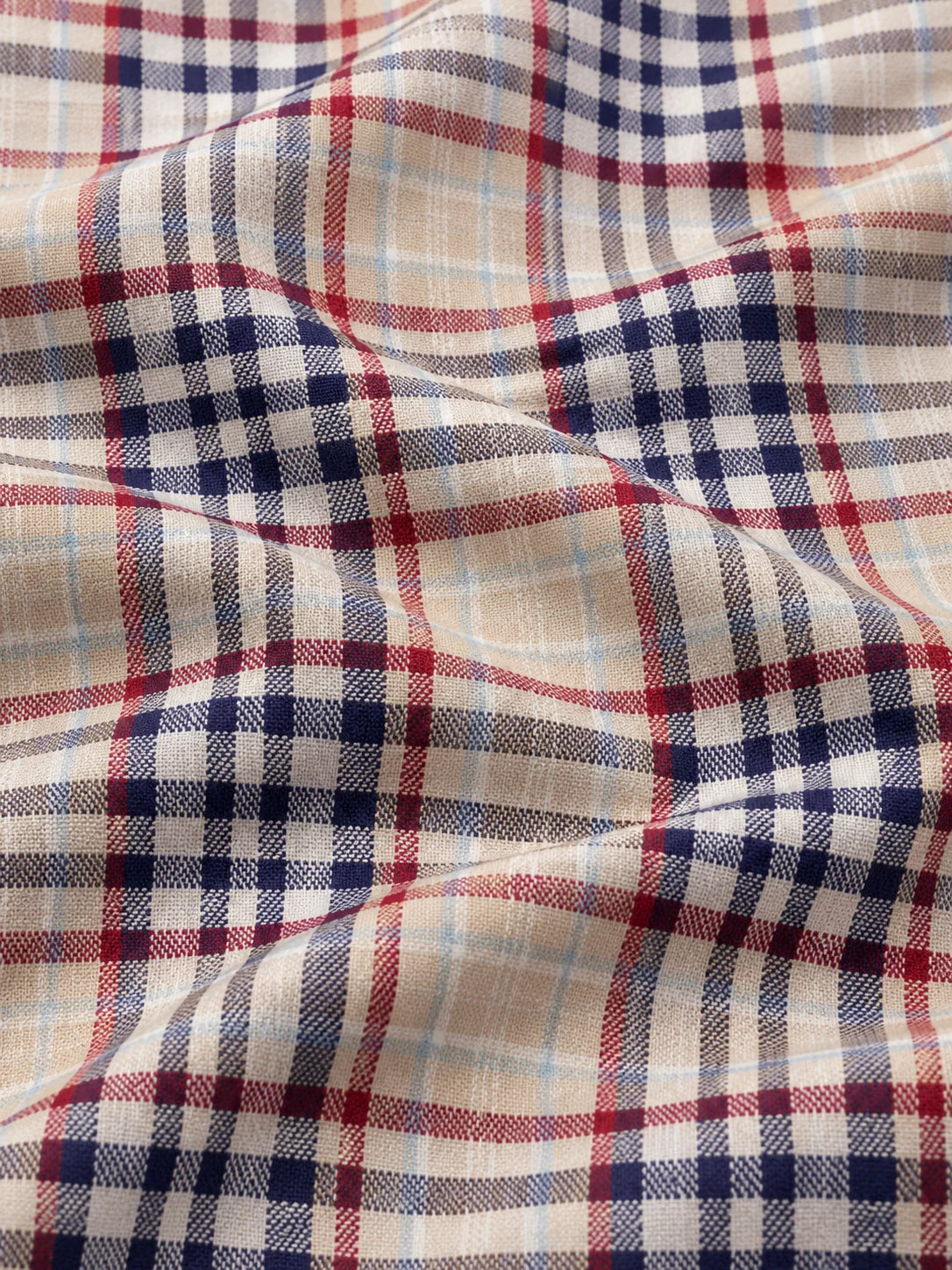 Cremefarbener Golf-Pullover mit Tartan-Karomuster und Viertelreißverschluss
