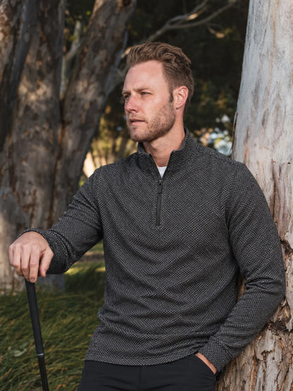 Anthrazitgrauer Golf-Pullover aus Birdseye-Funktionsstrick mit Viertelreißverschluss