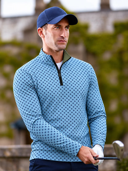 Performance-Golfpullover in Himmelblau mit Blumenmuster und Viertelreißverschluss