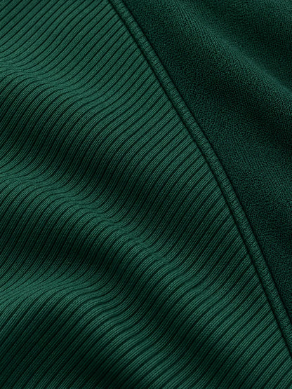 Golf-Pullover aus Funktionsmaterial in Waldgrün mit diagonaler Rippstruktur und Viertelreißverschluss